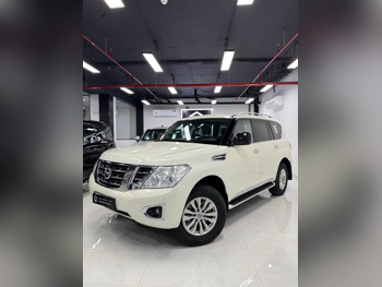 نيسان  باترول  أكس أي  2019  اوتوماتيك  125,000 كم  6 سلندر  دفع رباعي  اس يو في  أبيض