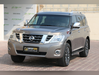 نيسان باترول بلاتنيوم 2015 اوتوماتيك 243,000 كم 8 سلندر دفع رباعي اس يو في رمادي