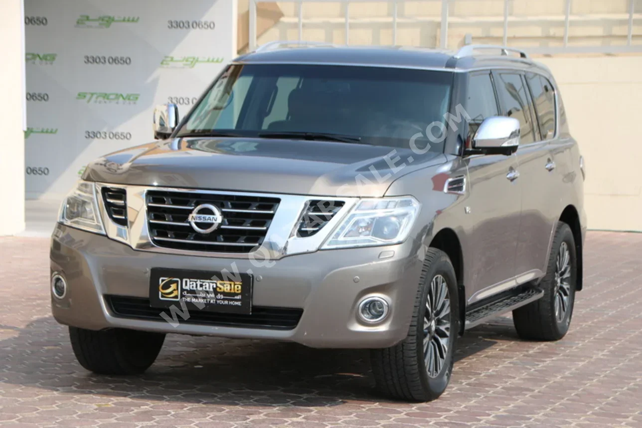 نيسان باترول بلاتنيوم 2015 اوتوماتيك 243,000 كم 8 سلندر دفع رباعي اس يو في رمادي