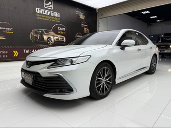 Toyota  Camry  Limited  2024  Automatic  95,000 Km  6 Cylinder  Front Wheel Drive (FWD)  Sedan  White  With Warranty