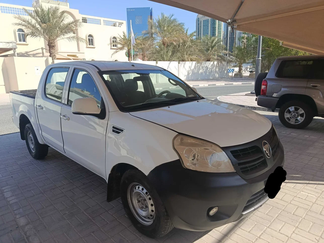 فوتون بيك اب تيولاند 2017 عادي 283,000 كم 4 سلندر دفع خلفي بيكب أبيض تحت الضمان