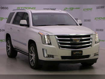 كاديلاك اسكيليد 2016 اوتوماتيك 109,000 كم 8 سلندر دفع رباعي اس يو في أبيض