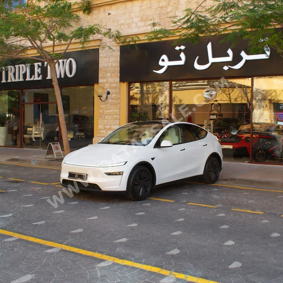 Tesla  Model Y  Long Range  2025  Automatic  0 Km  0 Cylinder  All Wheel Drive (AWD)  Sedan  White  With Warranty