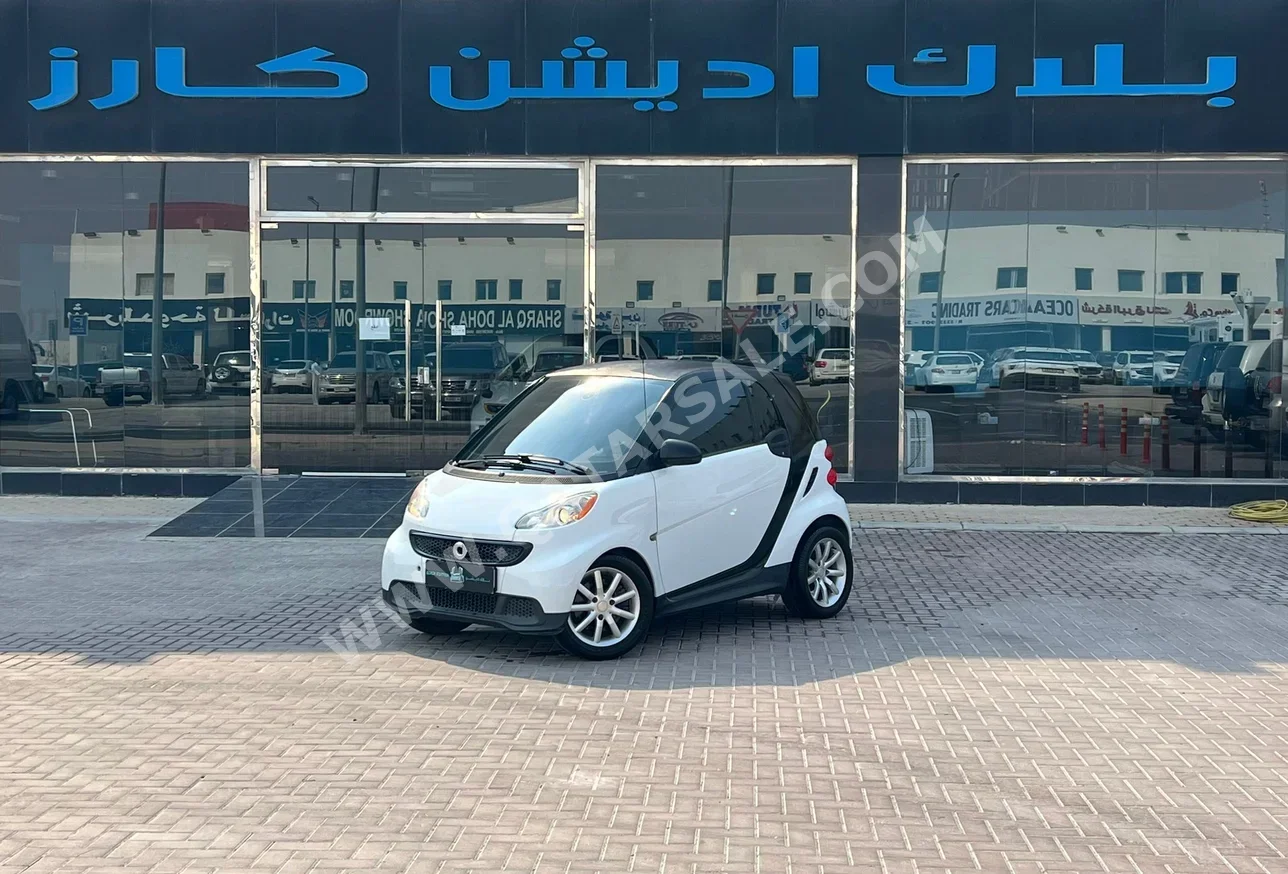 Smart  MHD  2013  Automatic  51,000 Km  3 Cylinder  Front Wheel Drive (FWD)  Hatchback  White