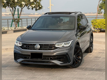 فوكس واغن  تيغوان  ار لاين  2022  اوتوماتيك  25,500 كم  4 سلندر  دفع رباعي  اس يو في  رمادي غامق  تحت الضمان