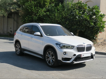 BMW  X-Series  X1  2019  Automatic  77,000 Km  4 Cylinder  Four Wheel Drive (4WD)  SUV  White