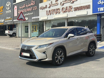 لكزس ار اكس 350 2016 اوتوماتيك 150,000 كم 6 سلندر دفع رباعي اس يو في ذهبي