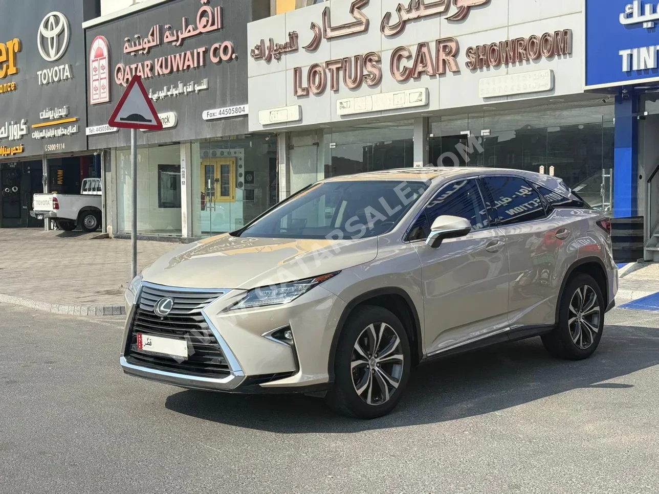لكزس ار اكس 350 2016 اوتوماتيك 150,000 كم 6 سلندر دفع رباعي اس يو في ذهبي