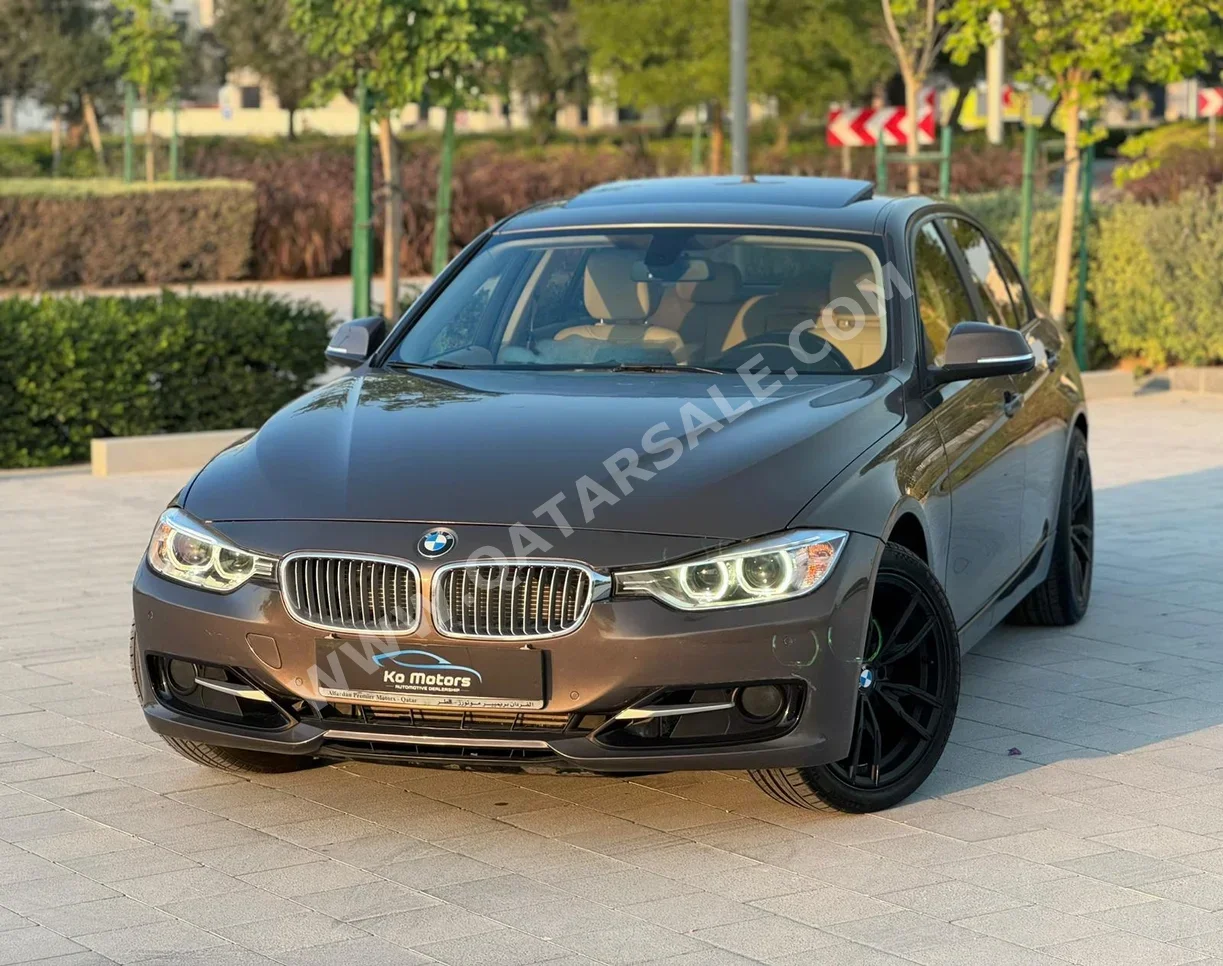 BMW  3-Series  316i  2014  Automatic  126,000 Km  4 Cylinder  Rear Wheel Drive (RWD)  Sedan  Gray