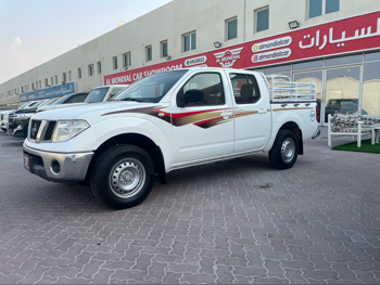 Nissan  Navara  SE  2012  Manual  258,000 Km  4 Cylinder  Rear Wheel Drive (RWD)  Pick Up  White