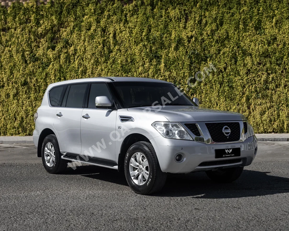 Nissan  Patrol  SE  2012  Automatic  184,000 Km  8 Cylinder  Four Wheel Drive (4WD)  SUV  Silver