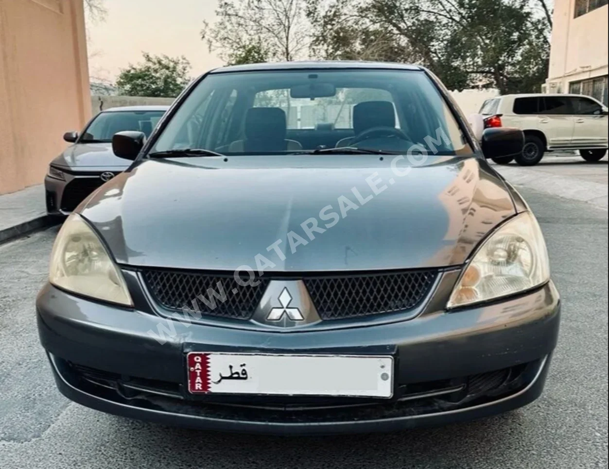 Mitsubishi  Lancer  2007  Automatic  300,000 Km  4 Cylinder  Sedan  Dark Gray  With Warranty