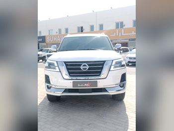 Nissan  Patrol  Platinum  2021  Automatic  72,000 Km  6 Cylinder  Four Wheel Drive (4WD)  SUV  White
