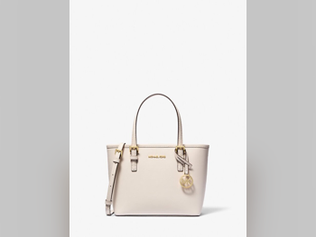 شنطة يد  - مايكل كورس  - كريم  - جلد اصلي  - نسائي