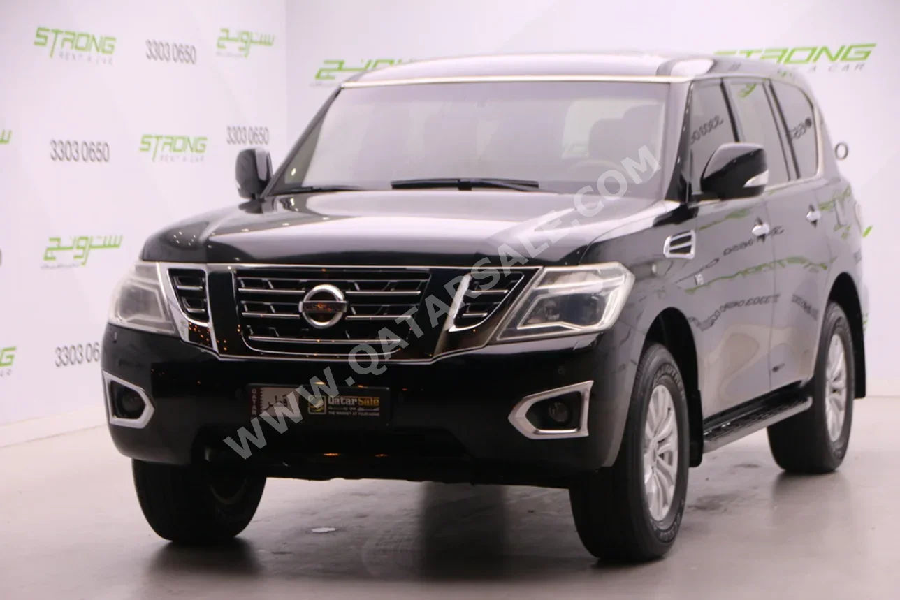 نيسان باترول اس اي 2014 اوتوماتيك 183,000 كم 8 سلندر دفع رباعي اس يو في أسود