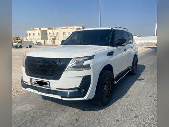 Nissan  Patrol  XE  2019  Automatic  200,000 Km  6 Cylinder  Four Wheel Drive (4WD)  SUV  White