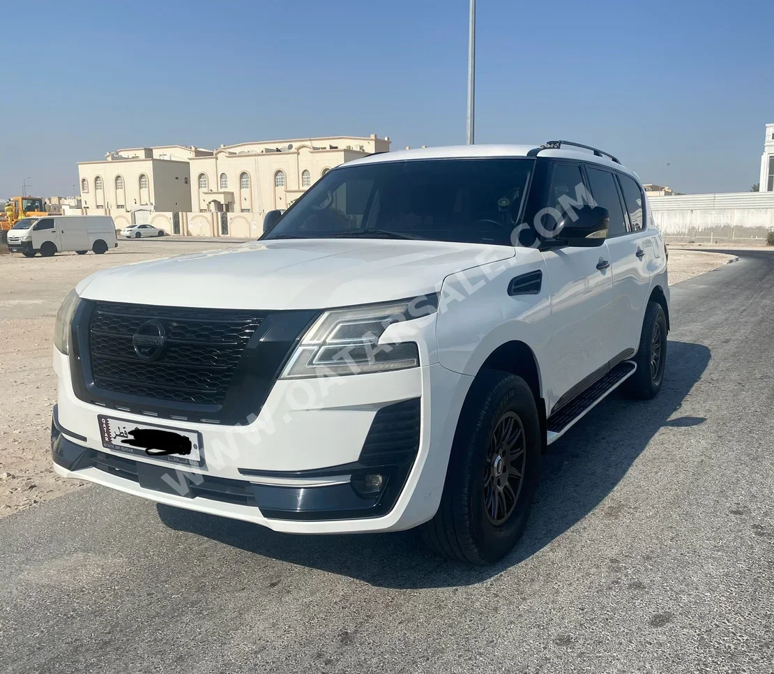 Nissan  Patrol  XE  2019  Automatic  200,000 Km  6 Cylinder  Four Wheel Drive (4WD)  SUV  White
