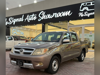Toyota  Hilux  2008  Manual  345,000 Km  4 Cylinder  Rear Wheel Drive (RWD)  Pick Up  Beige