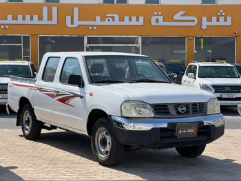 Nissan  Pickup  2014  Manual  243,000 Km  4 Cylinder  Rear Wheel Drive (RWD)  Pick Up  White