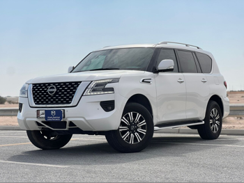 Nissan  Patrol  SE  2023  Automatic  26,000 Km  8 Cylinder  Four Wheel Drive (4WD)  SUV  White  With Warranty