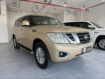 Nissan  Patrol  SE  2014  Automatic  265,000 Km  8 Cylinder  Four Wheel Drive (4WD)  SUV  Gold
