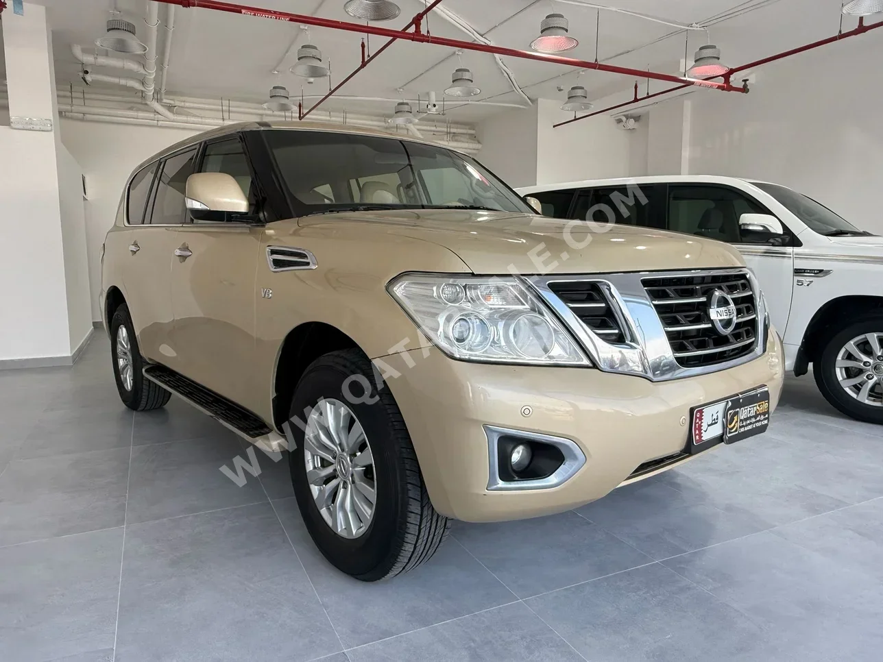 Nissan  Patrol  SE  2014  Automatic  265,000 Km  8 Cylinder  Four Wheel Drive (4WD)  SUV  Gold