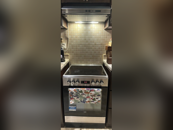 فرن  - غاز وكهرباء  - أسود