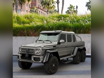 مرسيدس - بنز  جي - كلاس  63 اي ام جي  2015  اوتوماتيك  2,000 كم  8 سلندر  دفع رباعي  بيكب  رمادي  تحت الضمان