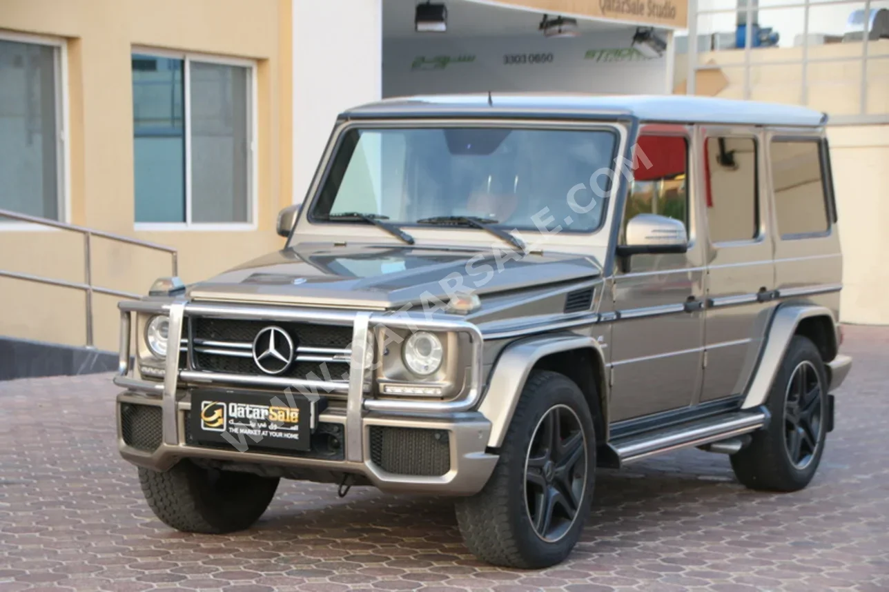 Mercedes-Benz  G-Class  63 AMG  2014  Automatic  135,000 Km  8 Cylinder  Four Wheel Drive (4WD)  SUV  Gold