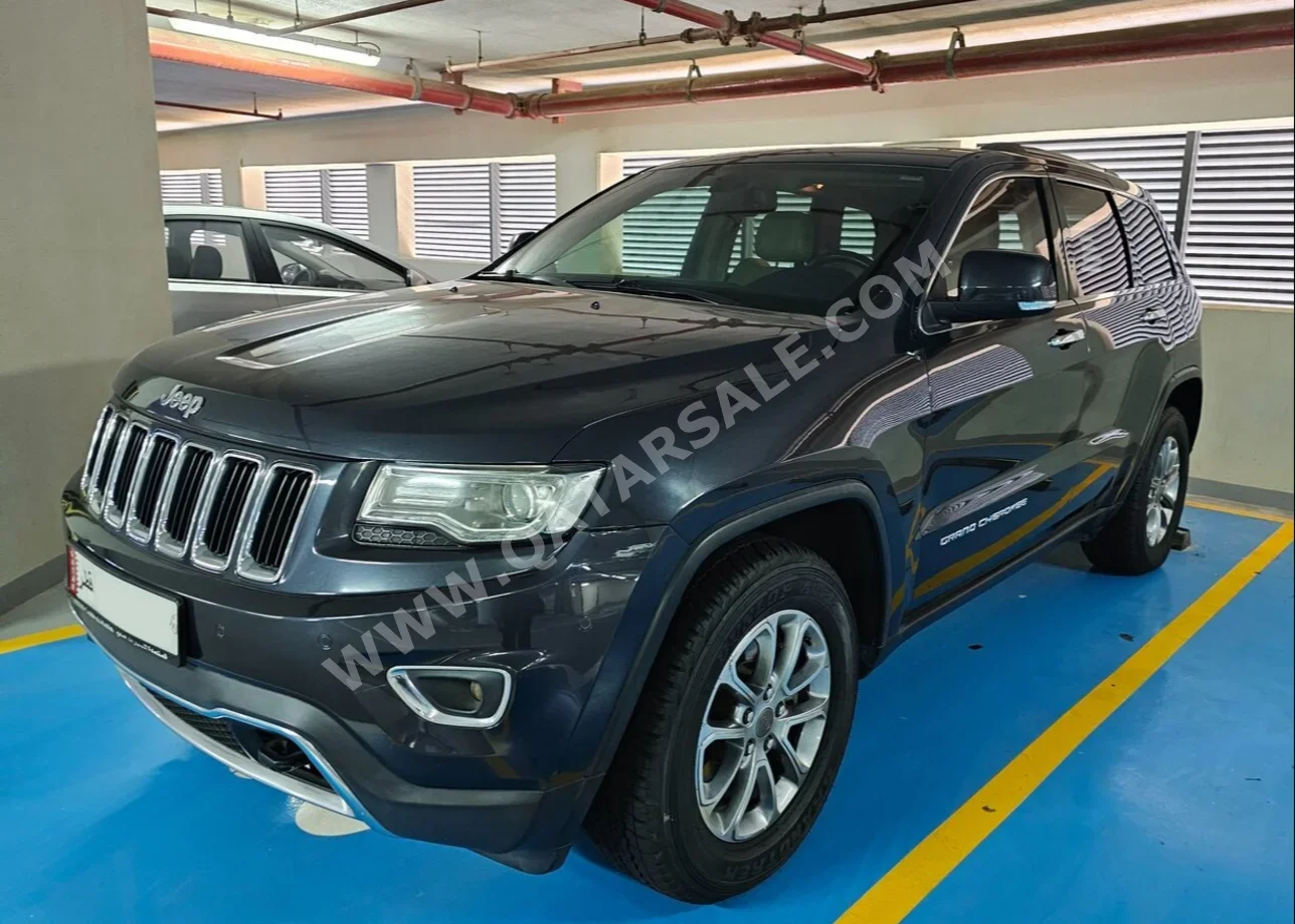 Jeep  Grand Cherokee  Limited  2015  Automatic  112,500 Km  6 Cylinder  Four Wheel Drive (4WD)  SUV  Gray Metallic  With Warranty
