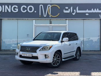 Lexus  LX  570  2014  Automatic  404,000 Km  8 Cylinder  Four Wheel Drive (4WD)  SUV  White