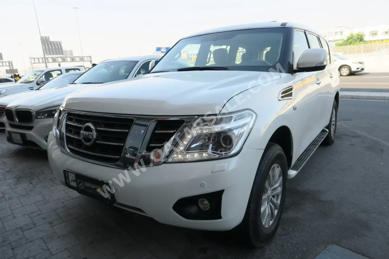 نيسان  باترول  اس اي  2014  اوتوماتيك  220,000 كم  8 سلندر  دفع رباعي  اس يو في  أبيض