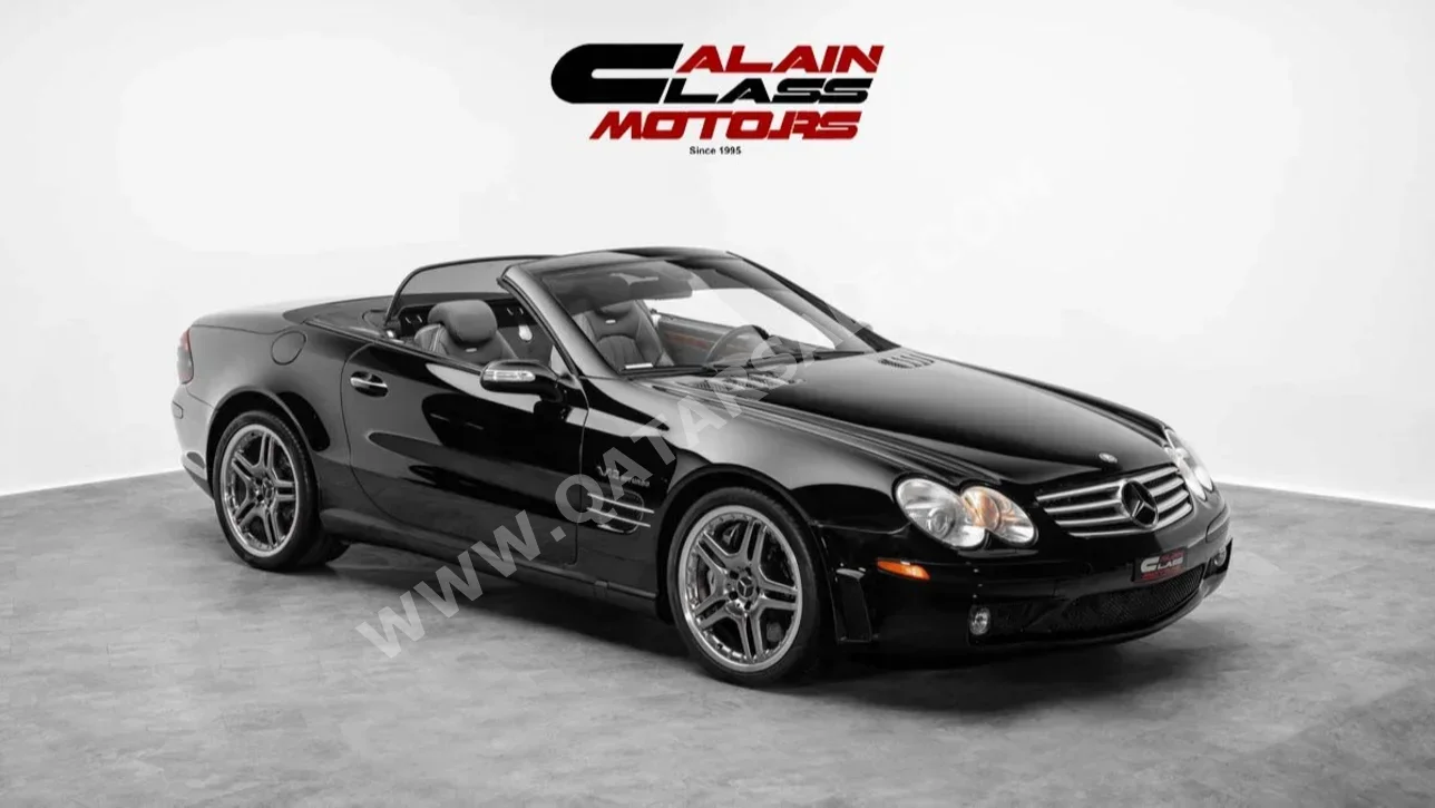 Mercedes-Benz  SL  65 AMG  2005  Automatic  37,765 Km  12 Cylinder  Rear Wheel Drive (RWD)  Convertible  Black