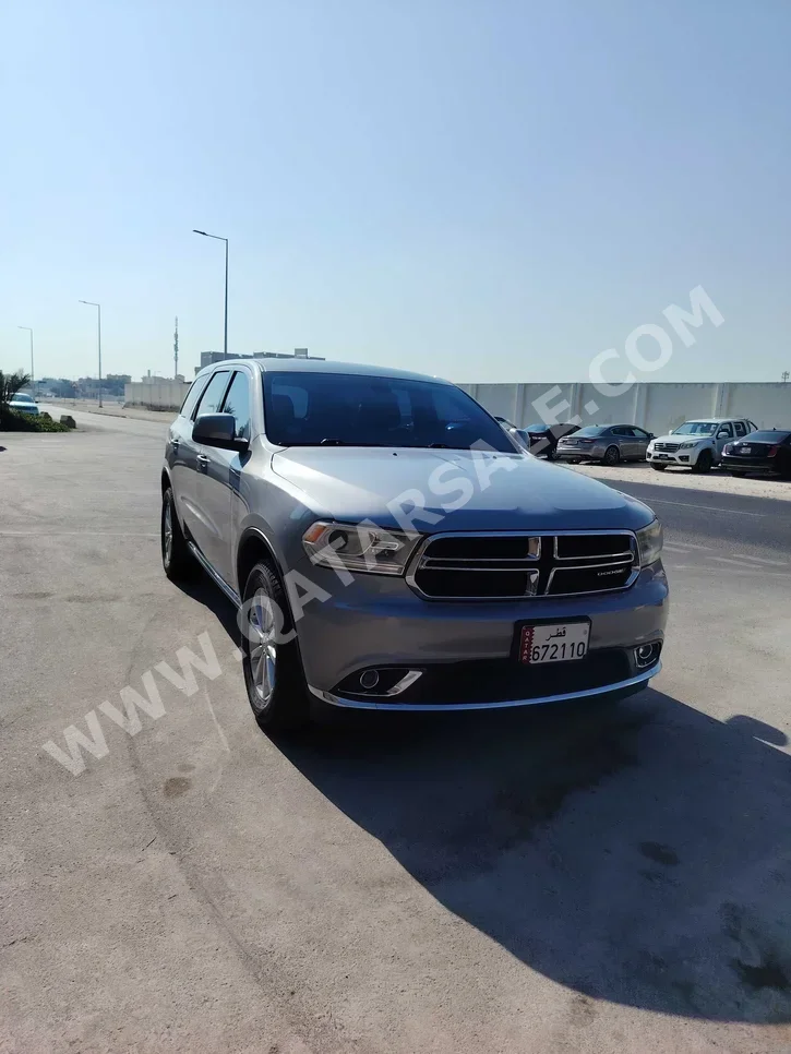 دودج دورانغو ال تي دي 2014 اوتوماتيك 140,000 كم 6 سلندر دفع رباعي اس يو في رمادي