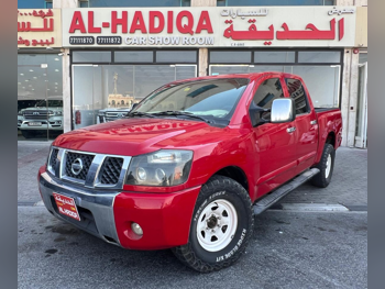 Nissan  Navara  2009  Automatic  211,000 Km  4 Cylinder  Rear Wheel Drive (RWD)  Pick Up  Red