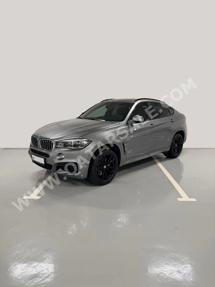 BMW  X-Series  X6 50i  2018  Automatic  98,000 Km  8 Cylinder  Four Wheel Drive (4WD)  SUV  Dark Gray