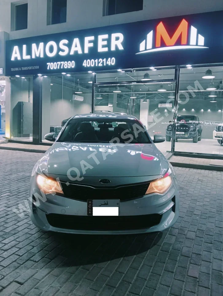 كيا اوبتما 2.4 2016 اوتوماتيك 214,000 كم 4 سلندر دفع خلفي سيدان أبيض