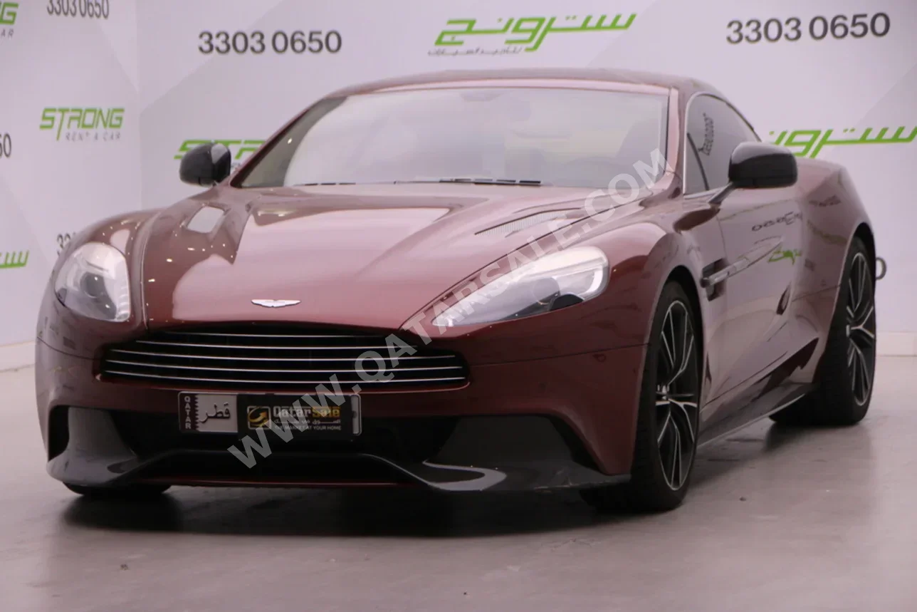 أستون مارتن  فانكوش  2013  اوتوماتيك  69,000 كم  12 سلندر  دفع كلي مستمر  كوبيه \ سبورت  عنابي
