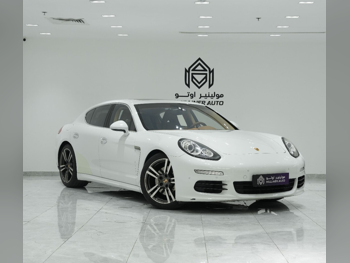 Porsche  Panamera  S  2014  Automatic  65,000 Km  6 Cylinder  Rear Wheel Drive (RWD)  Sedan  White