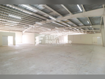 مخازن و مستودعات - الريان  - المنطقة الصناعية  -المساحة: 1800 متر مربع