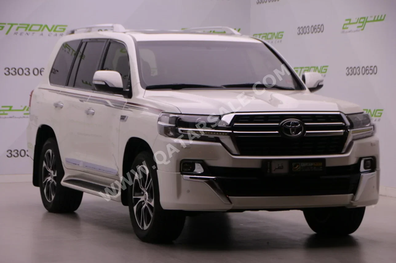 Toyota  Land Cruiser  GXR- Grand Touring  2021  Automatic  94,000 Km  6 Cylinder  Four Wheel Drive (4WD)  SUV  Pearl