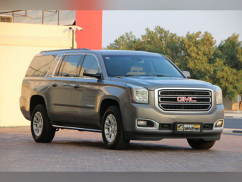 GMC  Yukon  SLE  2019  Automatic  96,000 Km  8 Cylinder  Rear Wheel Drive (RWD)  SUV  Gray