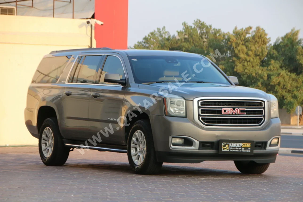 GMC  Yukon  SLE  2019  Automatic  96,000 Km  8 Cylinder  Rear Wheel Drive (RWD)  SUV  Gray
