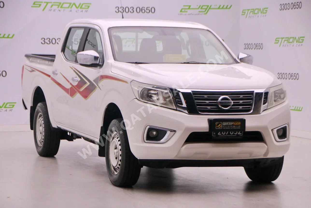 Nissan  Navara  2020  Automatic  63,000 Km  4 Cylinder  Four Wheel Drive (4WD)  Pick Up  White