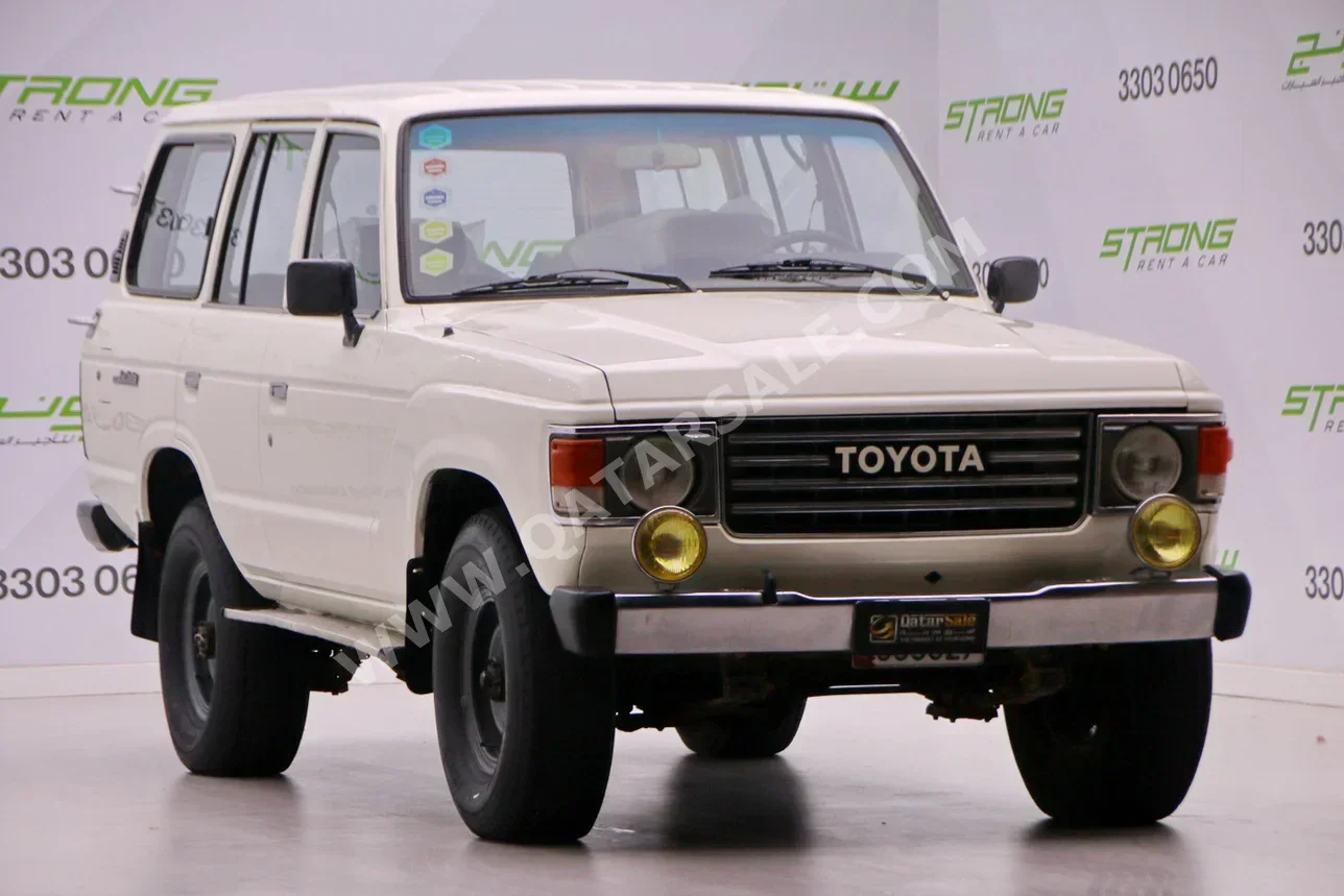 Toyota  Land Cruiser  1984  Manual  300,000 Km  6 Cylinder  Four Wheel Drive (4WD)  Classic  White