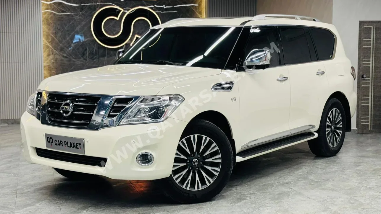 Nissan Patrol SE Platinum 2015 Automatic 316,000 Km 8 Cylinder Four Wheel Drive (4WD) SUV White