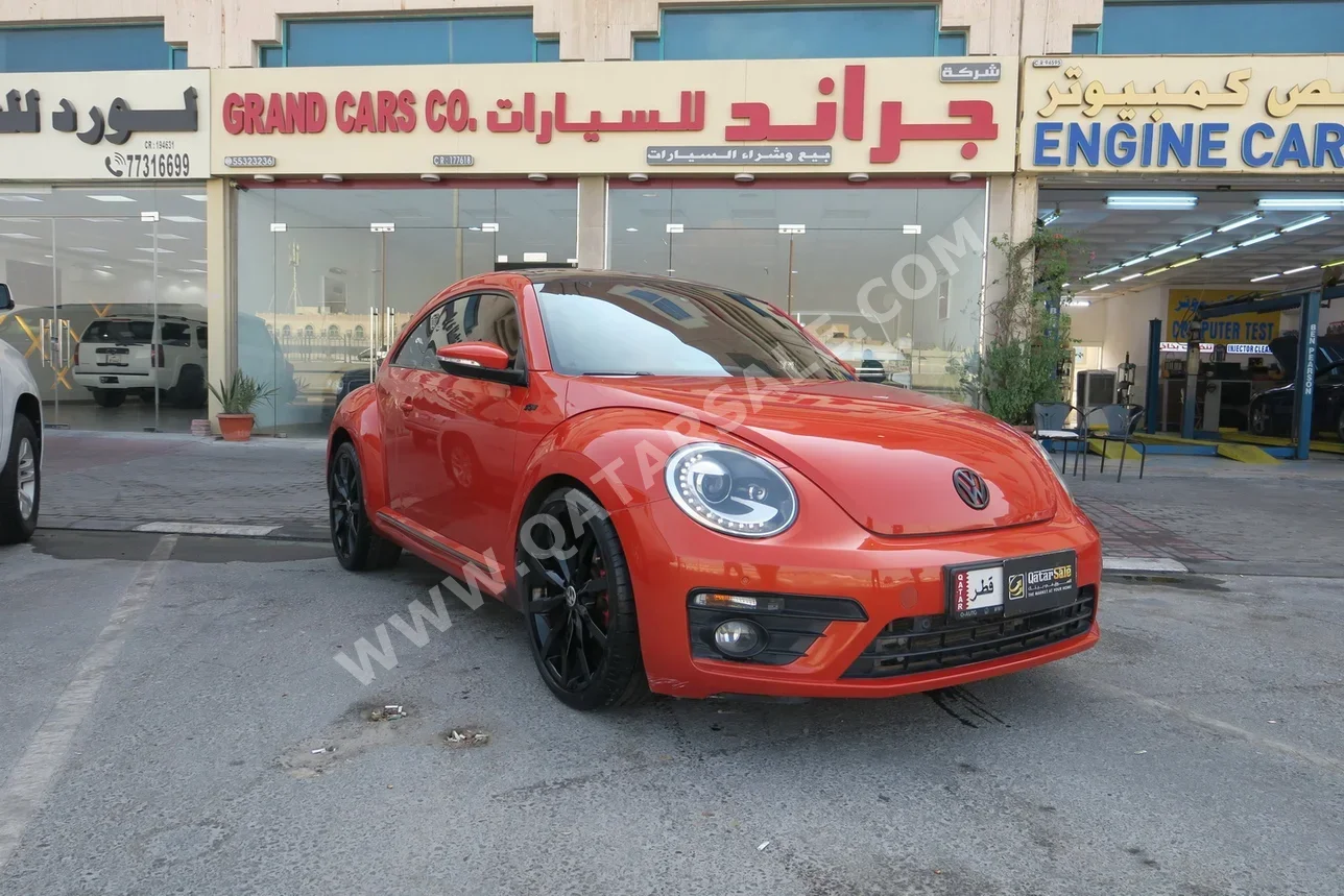Volkswagen  Beetle  2016  Automatic  171,000 Km  4 Cylinder  Front Wheel Drive (FWD)  Hatchback  Orange