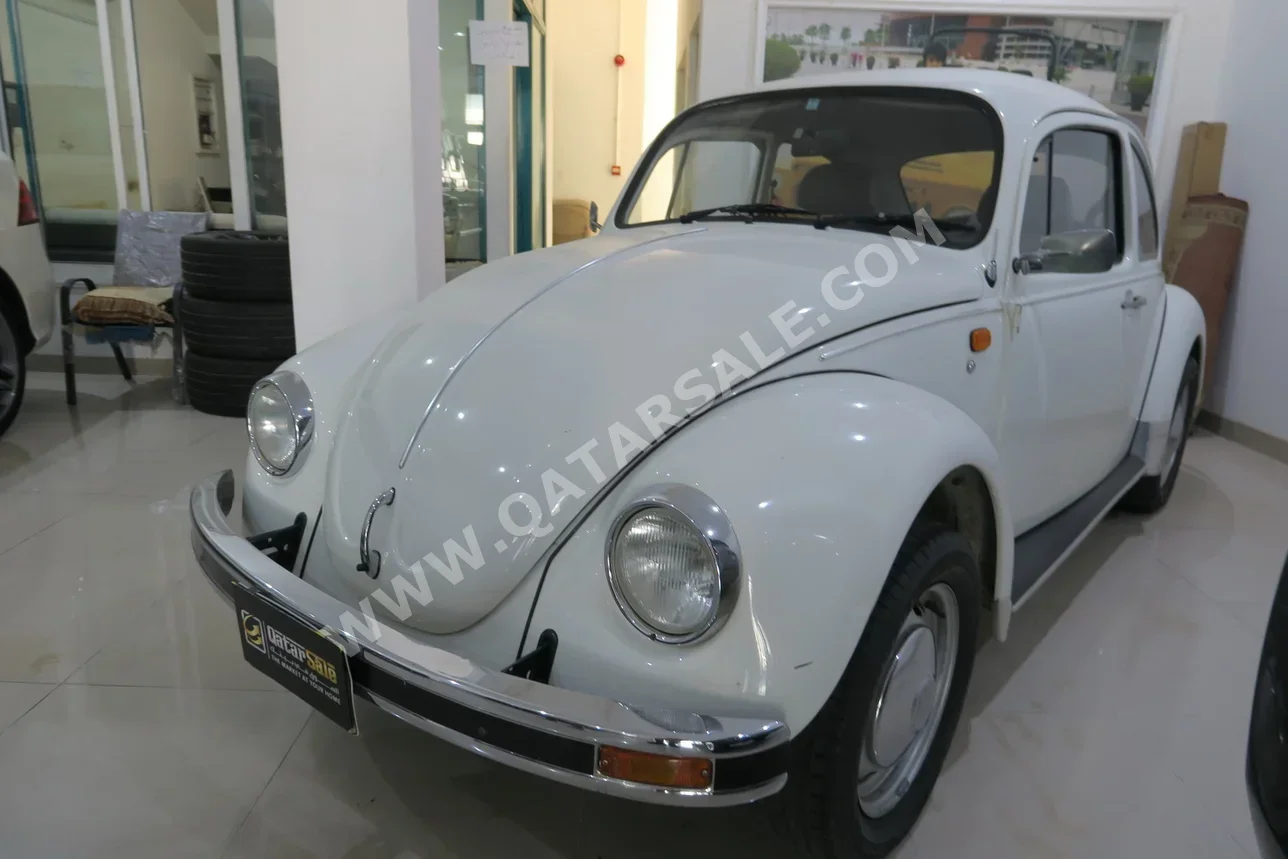 Volkswagen  Beetle  2003  Manual  29,000 Km  4 Cylinder  Rear Wheel Drive (RWD)  Hatchback  White