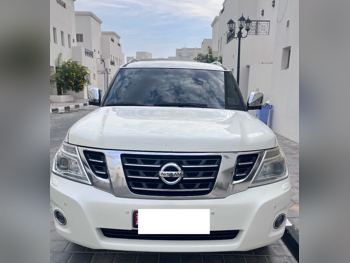 Nissan  Patrol  Platinum  2015  Automatic  224,000 Km  8 Cylinder  Four Wheel Drive (4WD)  SUV  White