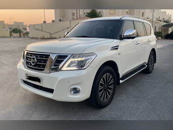 Nissan Patrol Platinum 2014 Automatic 200,000 Km 8 Cylinder Four Wheel Drive (4WD) SUV White